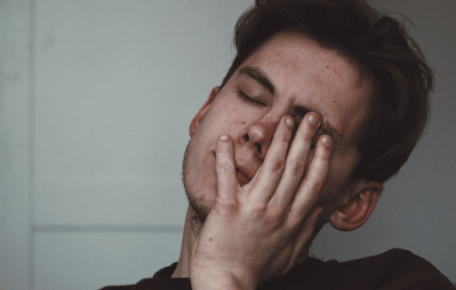 Prather-Sinus Problems 1 Person with their hand over the left side of their face.