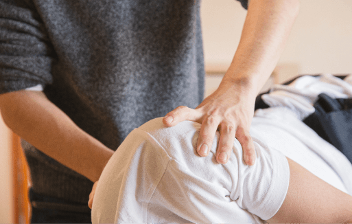 Prather-Shoulder Pain 2 Chiropractor adjusting a patient's shoulder.